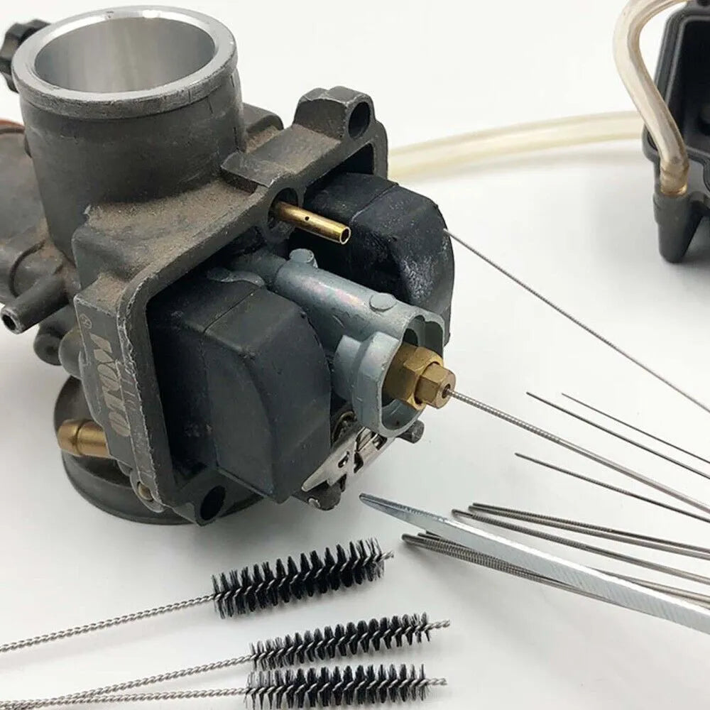 Engine carburetor with cleaning brushes on a white background