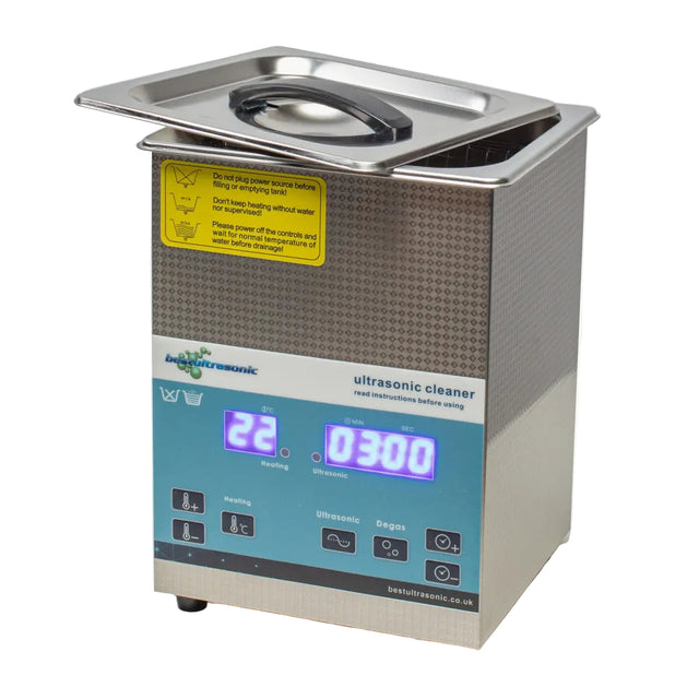 Ultrasonic cleaner with digital display on a white background
